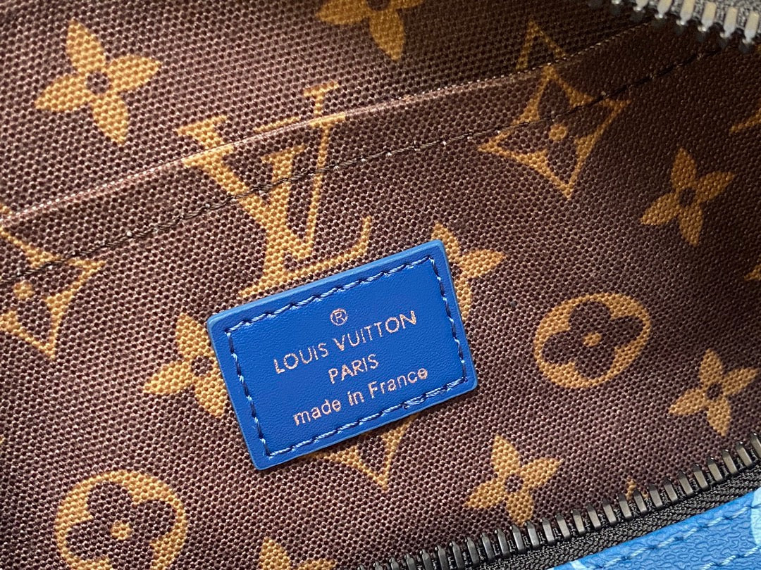 Louis Vuitton Keepall Bandouliere 25 Monogram Embossed Blue
