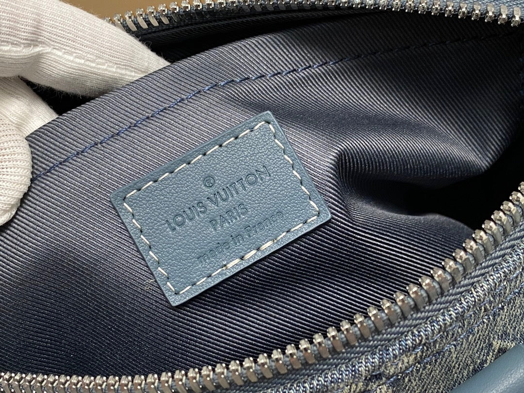 Louis Vuitton Keepall Bandouliere 25 Monogram Embossed Blue And Gray Denim