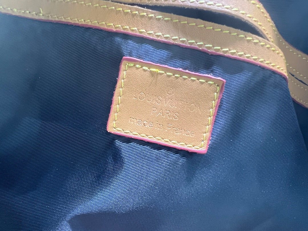 Louis Vuitton Keepall Bandouliere 55 Monogram Embossed Brown-orange Stripes