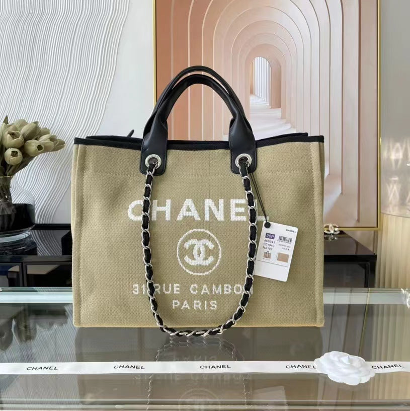 CHANEL Beach Canvas Tote Bag In Light Bown With Black Leather Strap