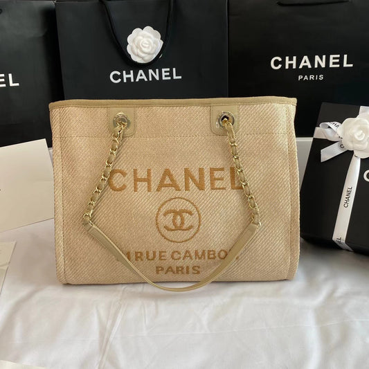 CHANEL Beach Canvas Tote Bag In Light Brown With Gold Tone Chain Link