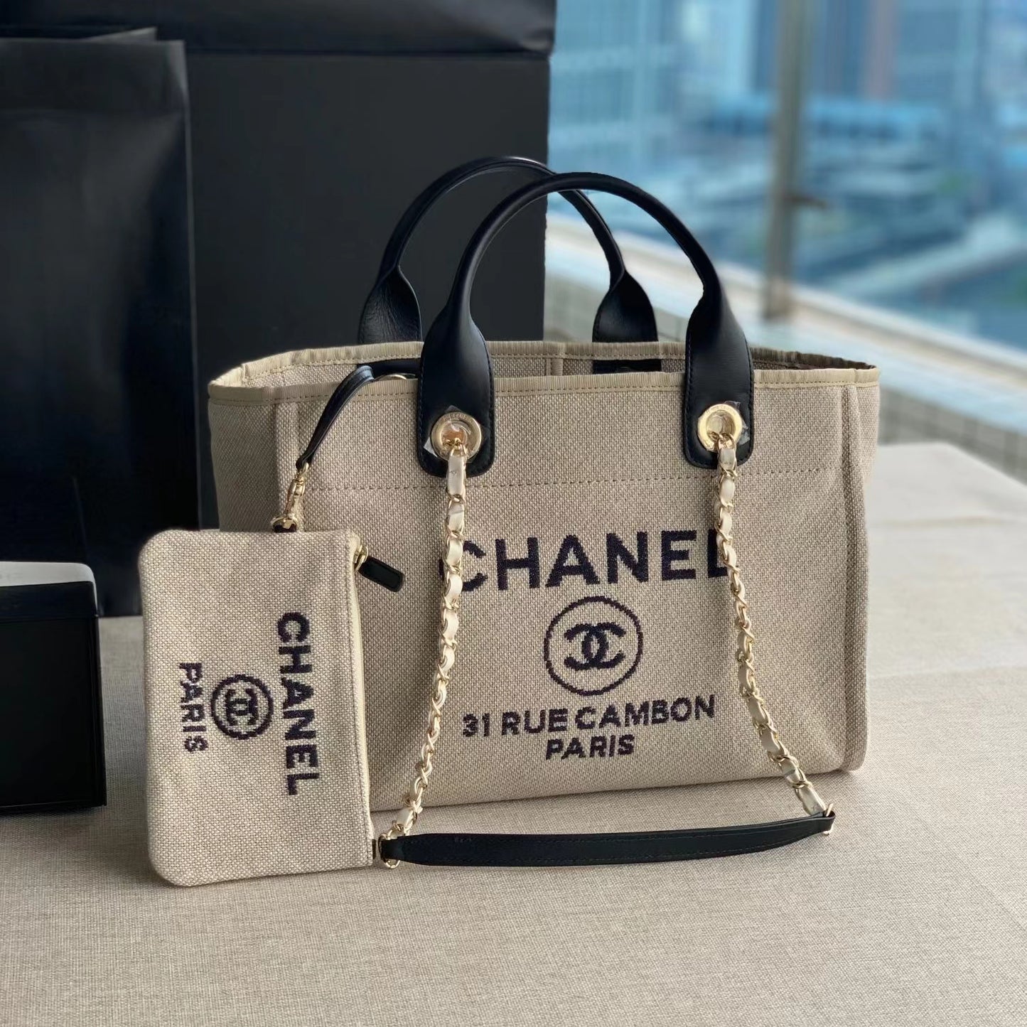 CHANEL Beach Canvas Tote Bag In Beige with Black Shoulder Straps