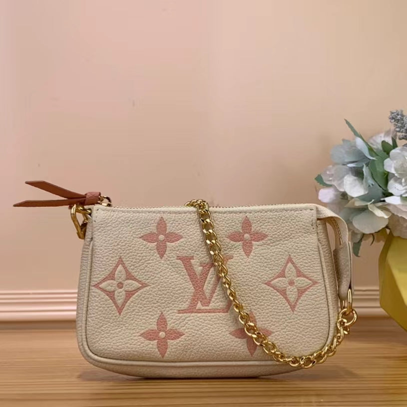 Louis Vuitton Mini Pochette Accessories In Pink Presbyopia