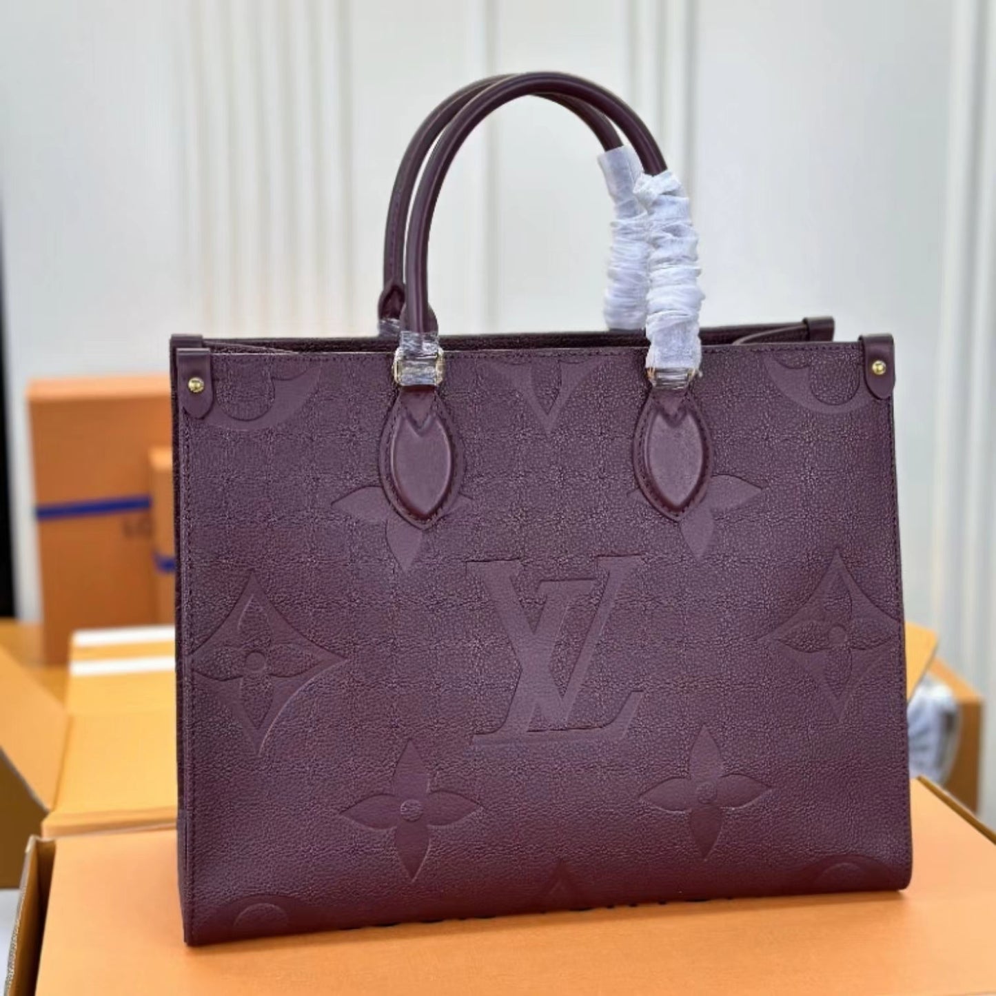 Louis Vuitton Onthego Handbags With Burgundy Embossed