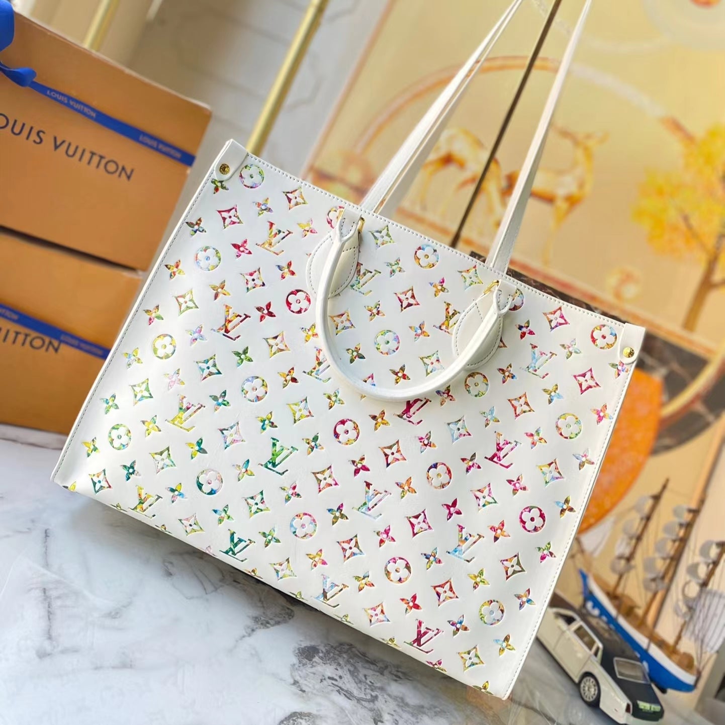 Louis Vuitton Onthego In White With Colorful Printed Tote Bag