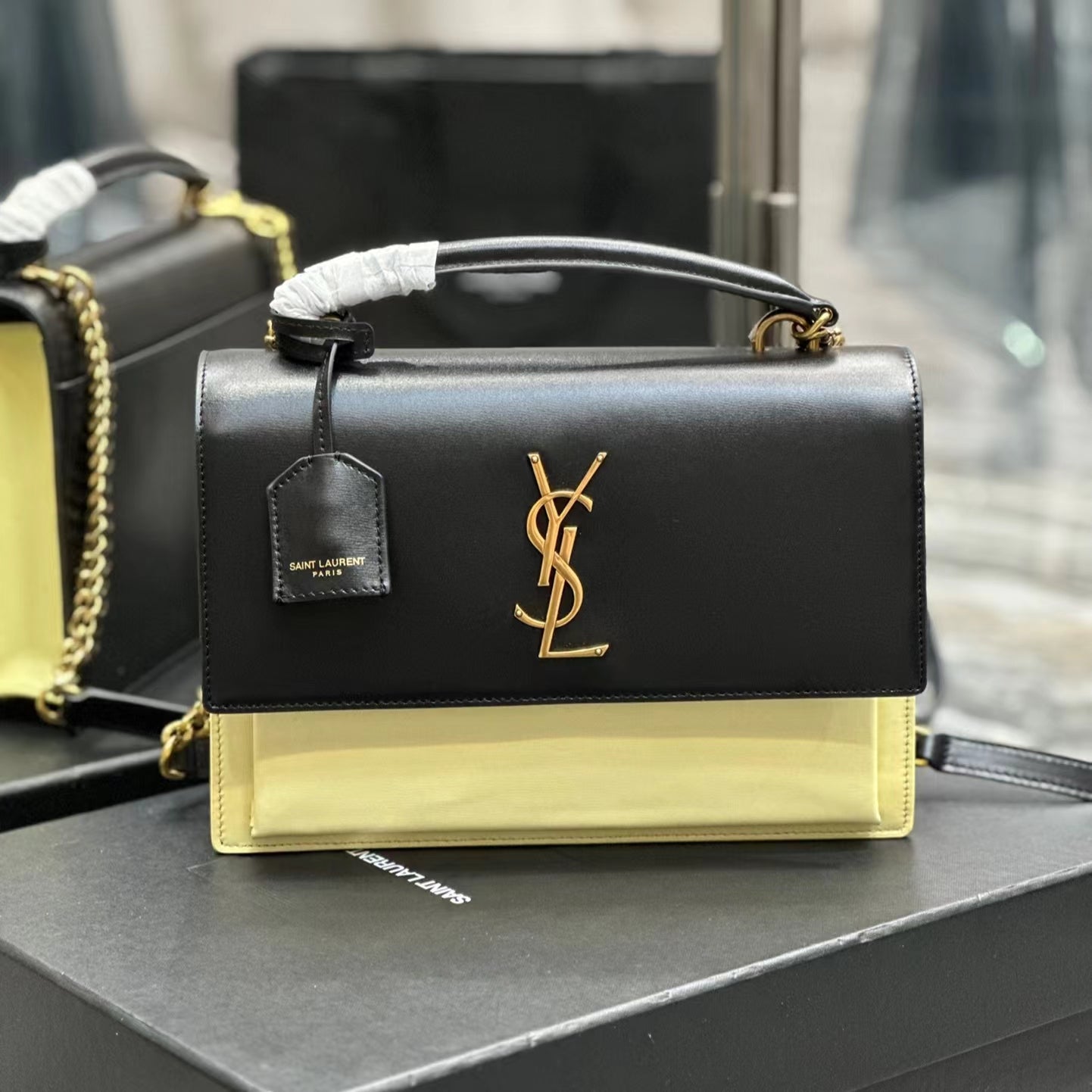 Saint Laurent Sunset Large Top Handle Bag In Black And Yellow Calfskin