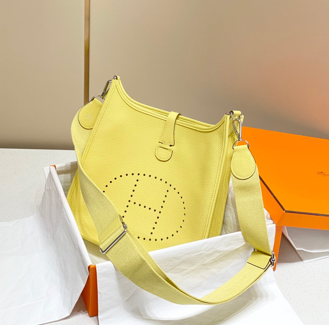 Hermes Evelyne III 29 Bag In Jaune Poussin Taurillon Clemence Leather