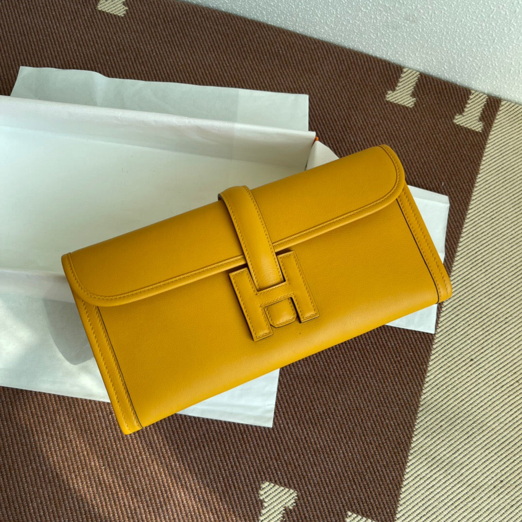 Hermes Jige Elan 29 Clutch Bag In Jaune Ambre Swift Leather