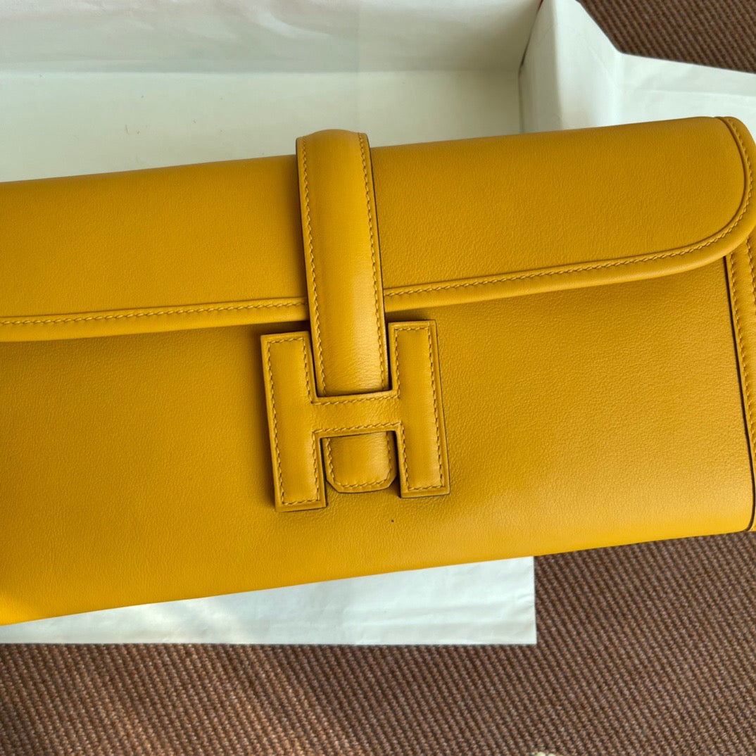 Hermes Jige Elan 29 Clutch Bag In Jaune Ambre Swift Leather