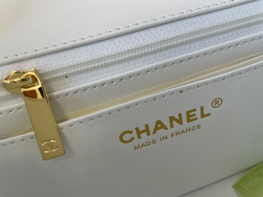 Chanel Mini Flap In White Lambskin