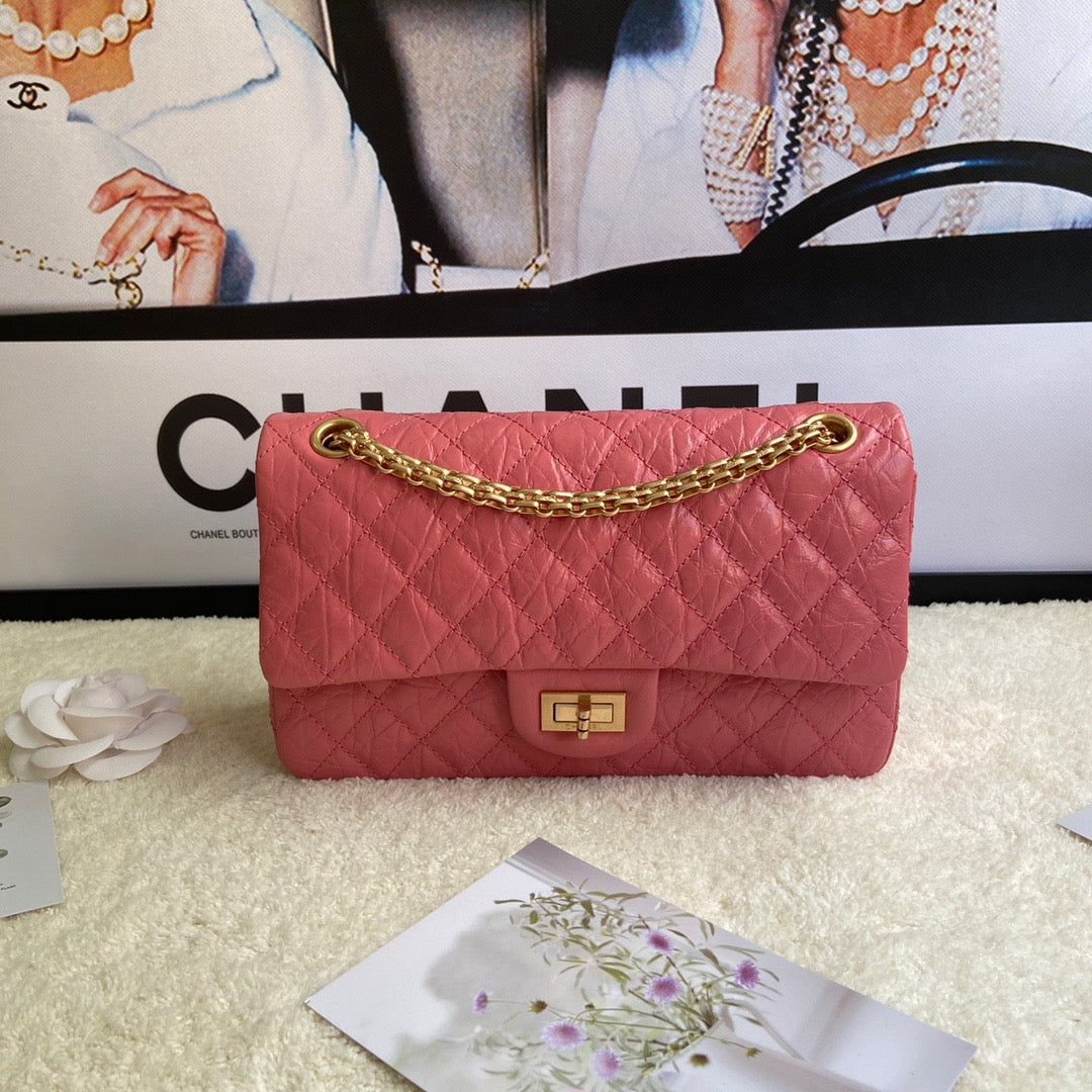 Chanel 2.55 Reissue 24 cm Flap Bag In Pomegranate Red