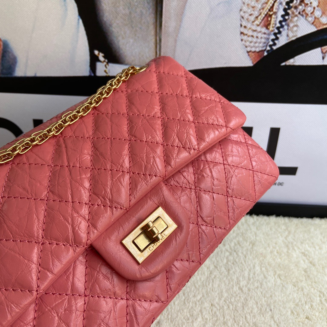 Chanel 2.55 Reissue 24 cm Flap Bag In Pomegranate Red