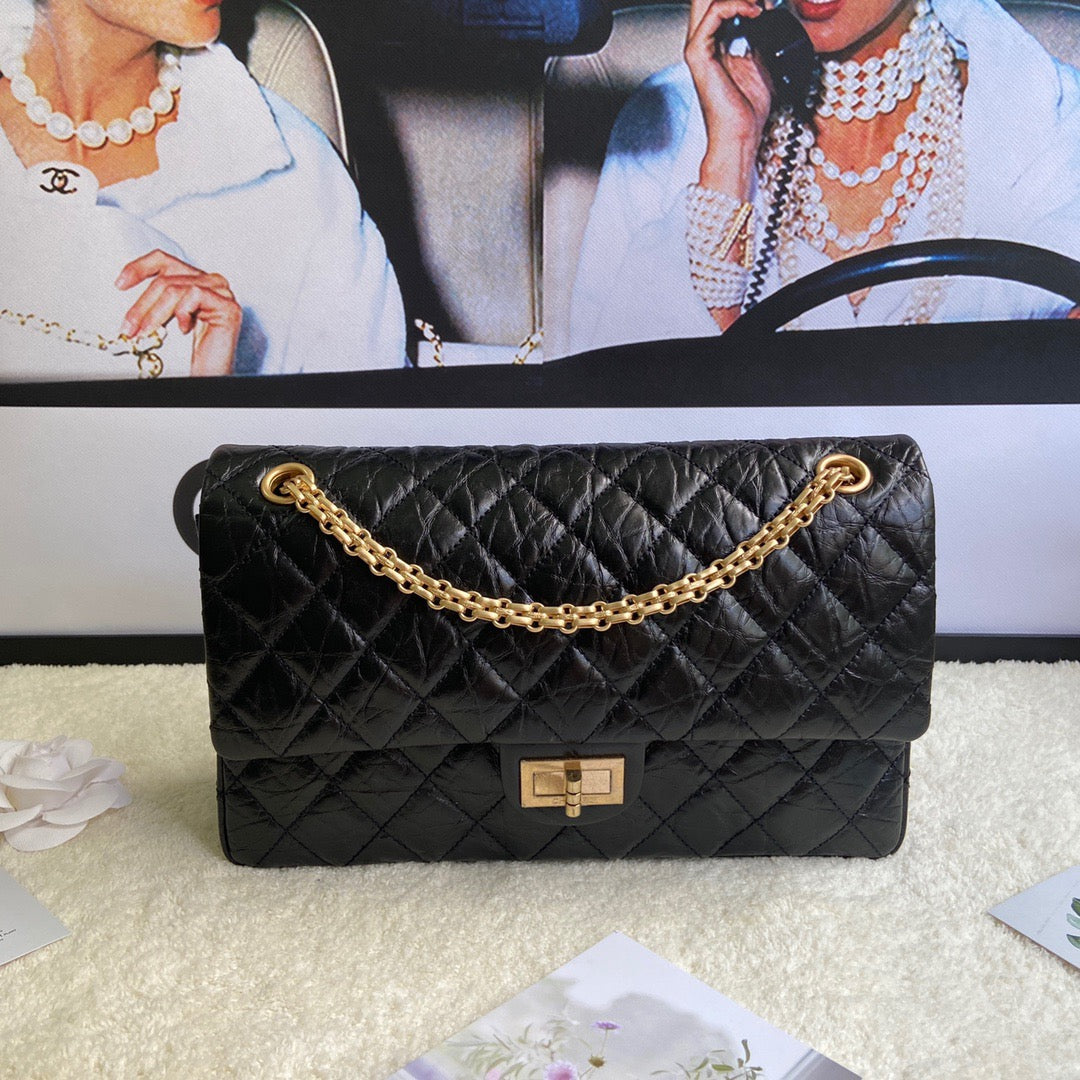 Chanel 2.55 Reissue 28 cm Flap Bag In Black