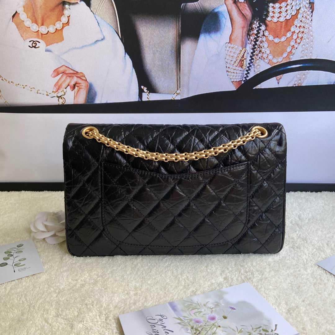 Chanel 2.55 Reissue 28 cm Flap Bag In Black