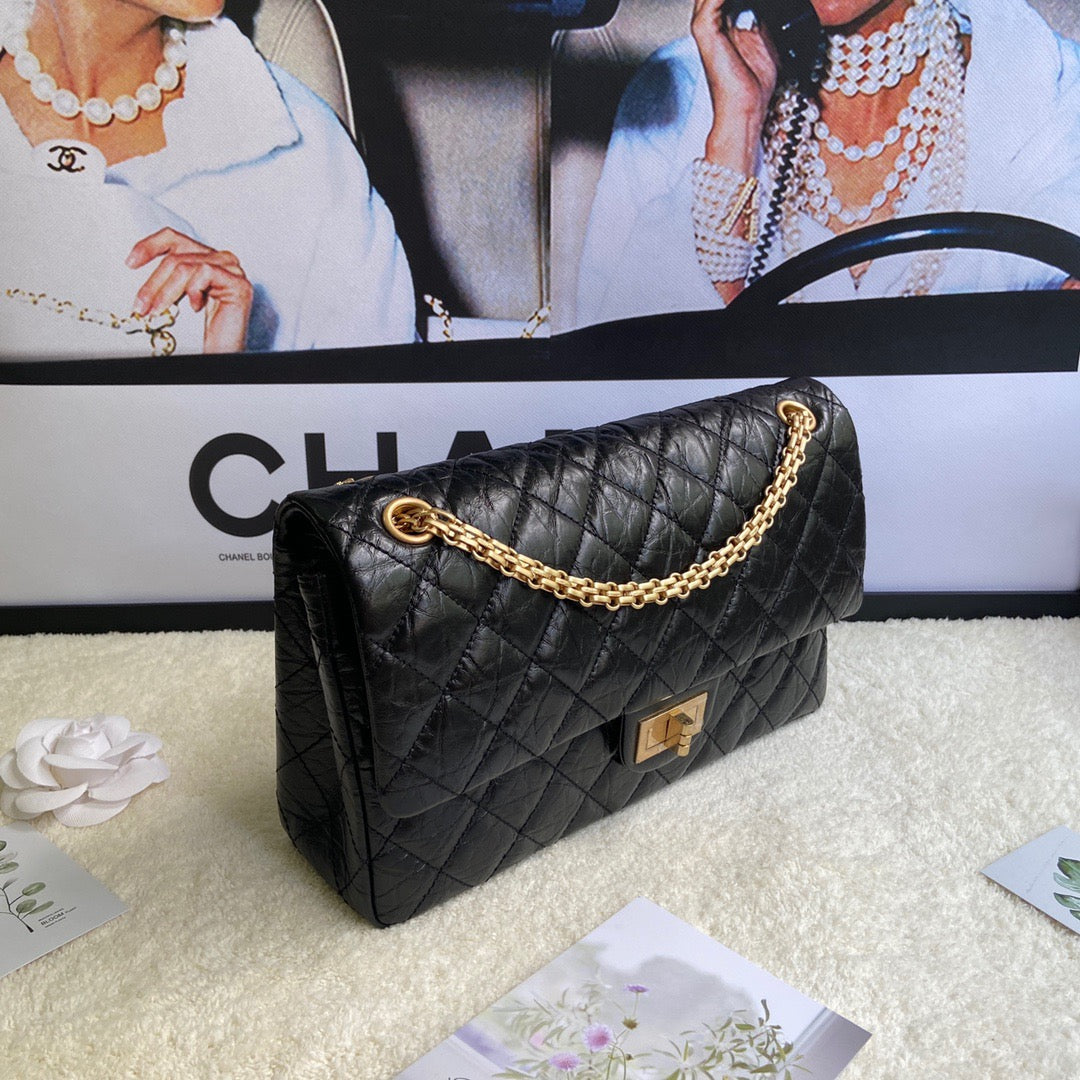 Chanel 2.55 Reissue 28 cm Flap Bag In Black