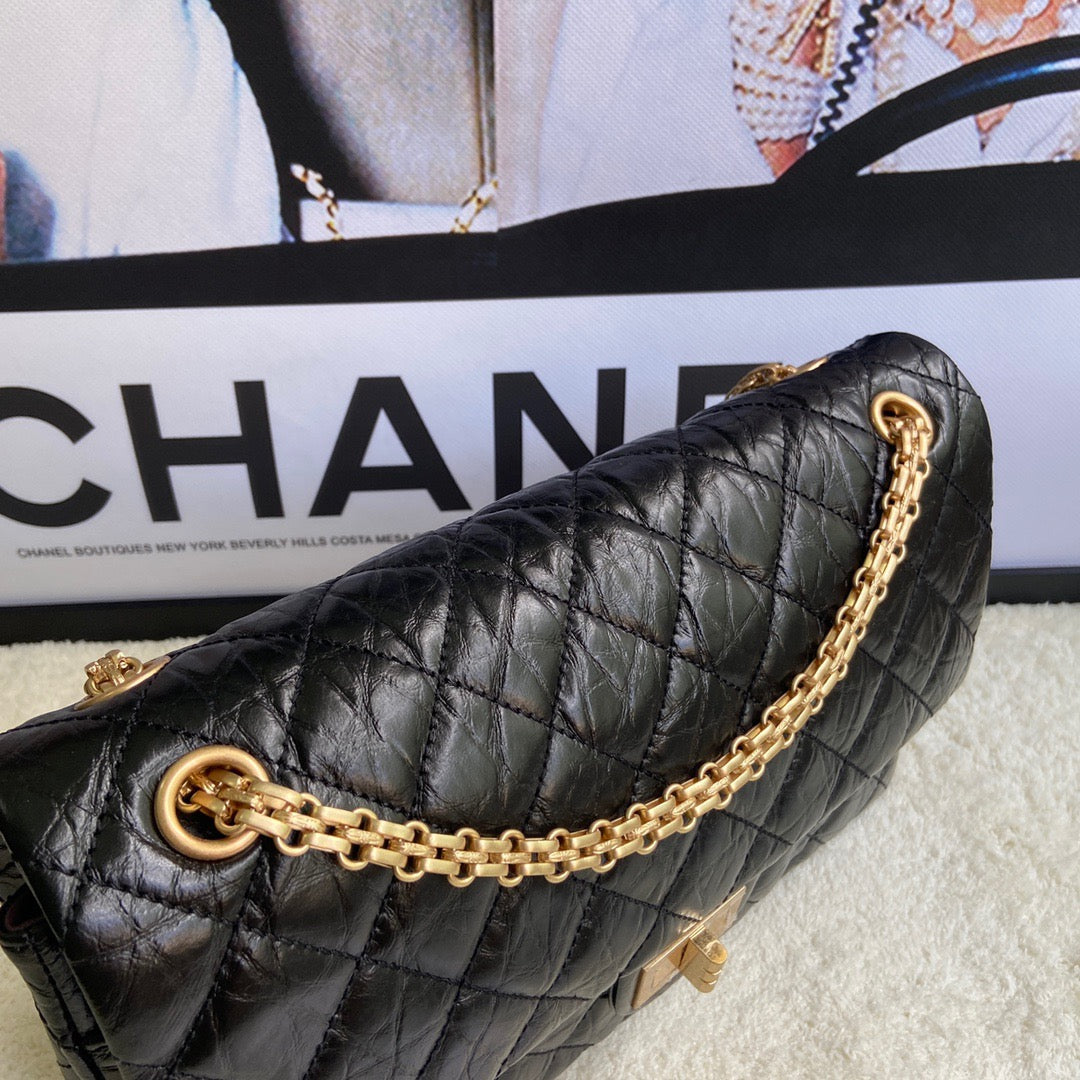 Chanel 2.55 Reissue 28 cm Flap Bag In Black