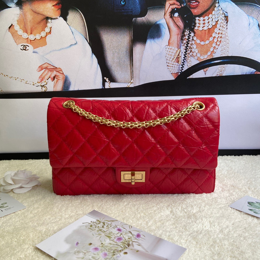 Chanel 2.55 Reissue 28 cm Flap Bag In Red