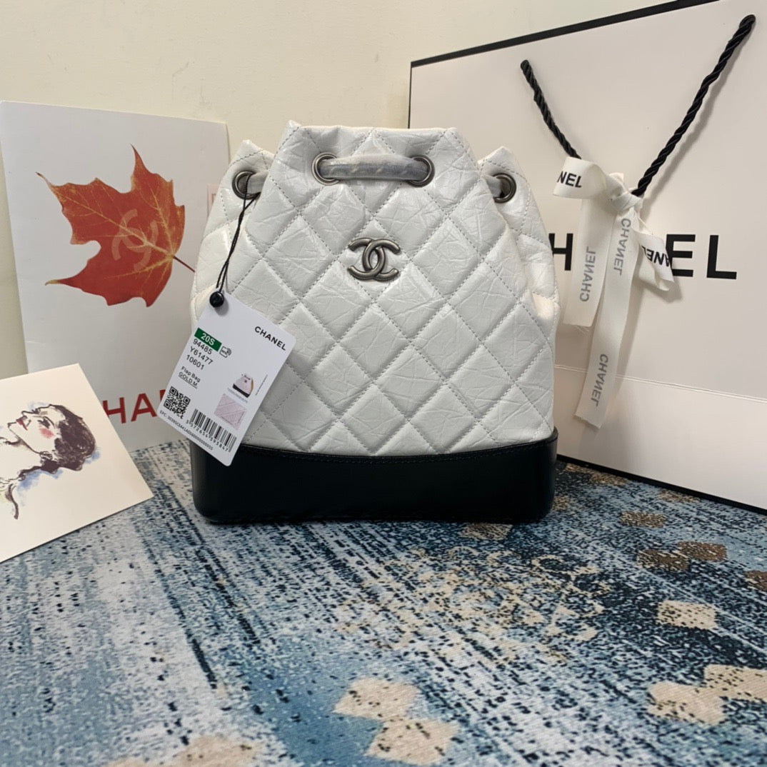 Chanel Backpack In White and Black Calfskin Leather