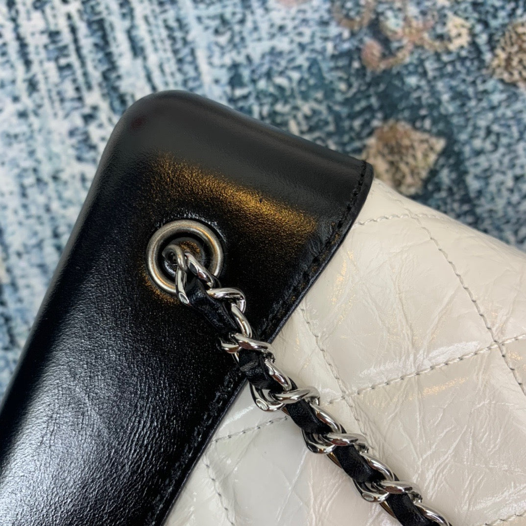 Chanel Backpack In White and Black Calfskin Leather