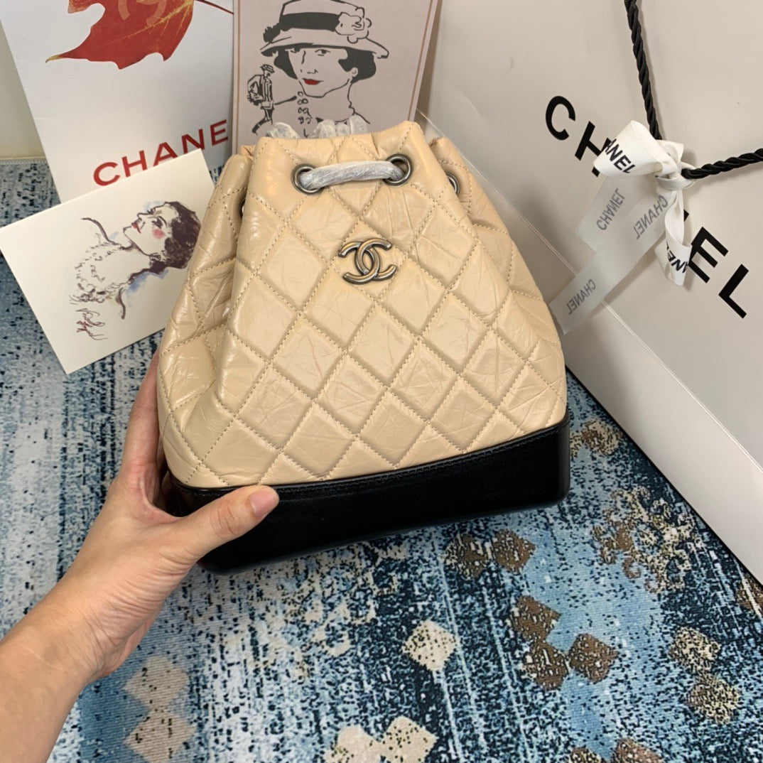 Chanel Backpack In Beige and Black Calfskin Leather