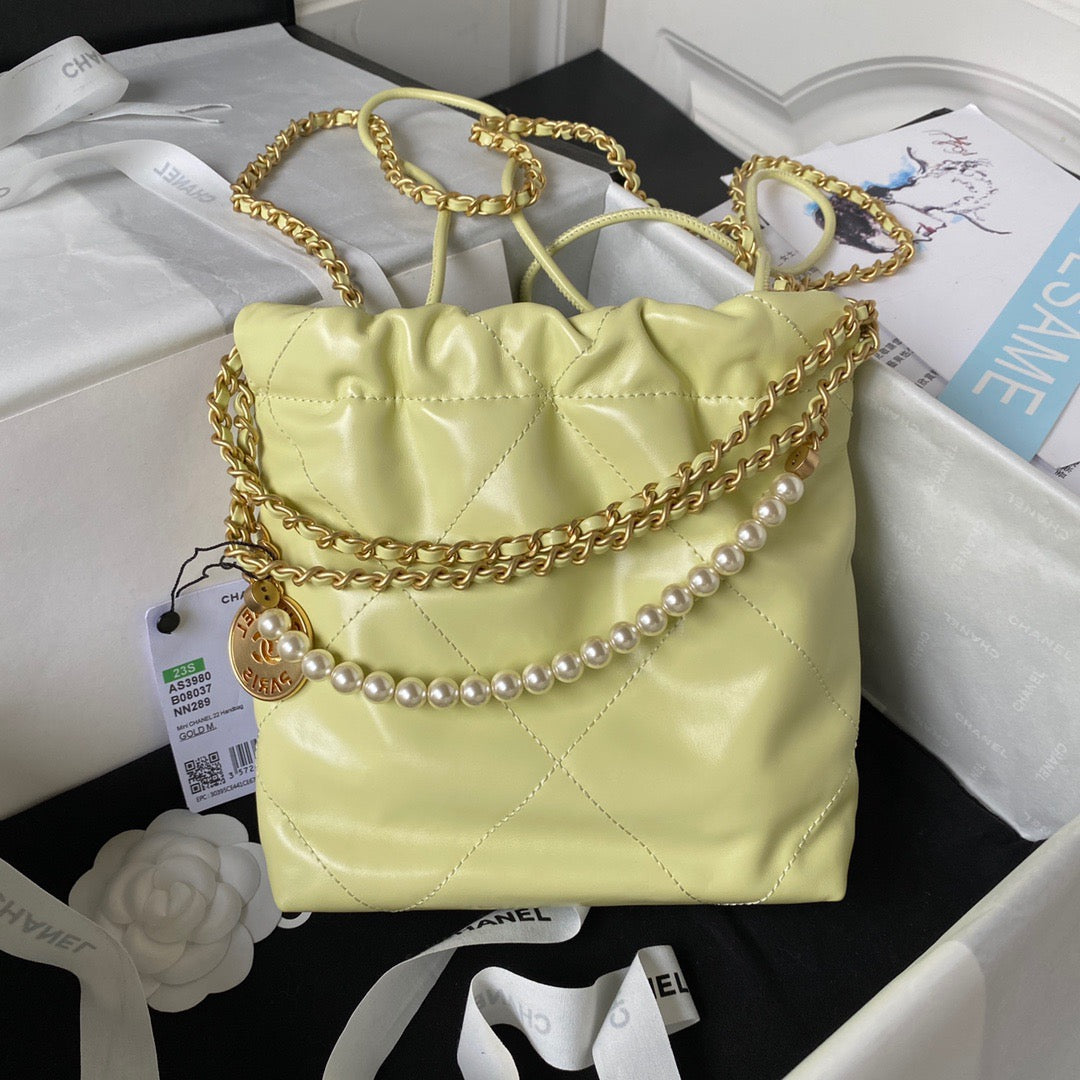 Chanel 22 Mini Pearl Bag In Yellow Shiny Leather