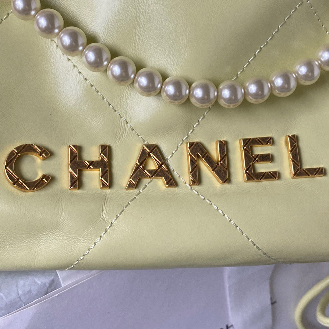 Chanel 22 Mini Pearl Bag In Yellow Shiny Leather