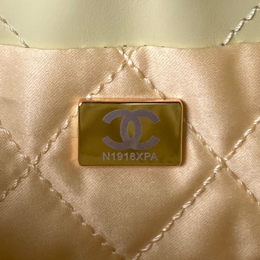 Chanel 22 Mini Pearl Bag In Yellow Shiny Leather