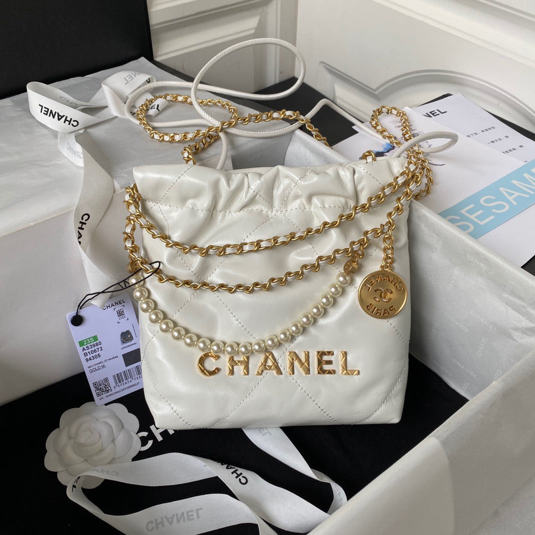 Chanel 22 Mini Pearl Bag In White Shiny Leather