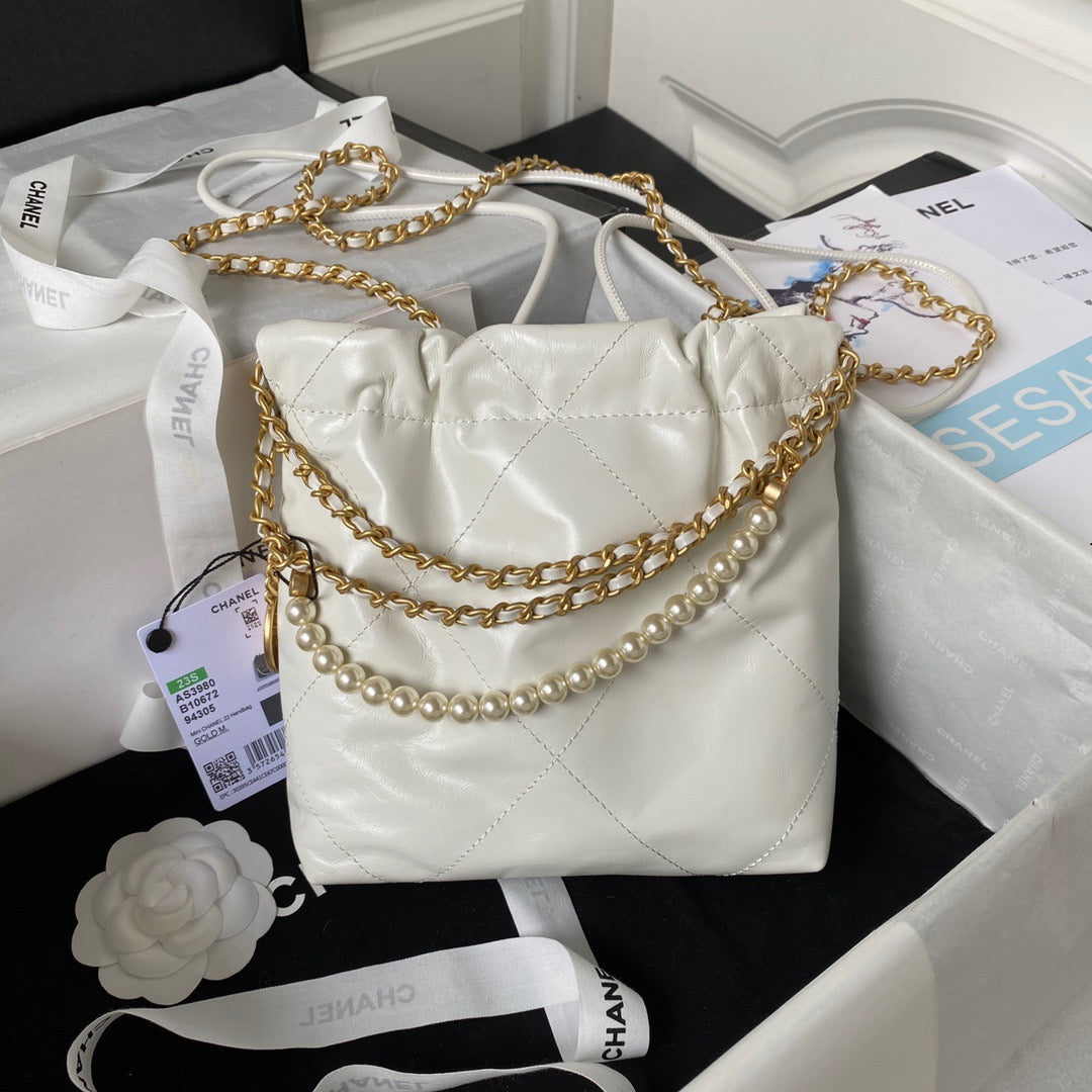 Chanel 22 Mini Pearl Bag In White Shiny Leather