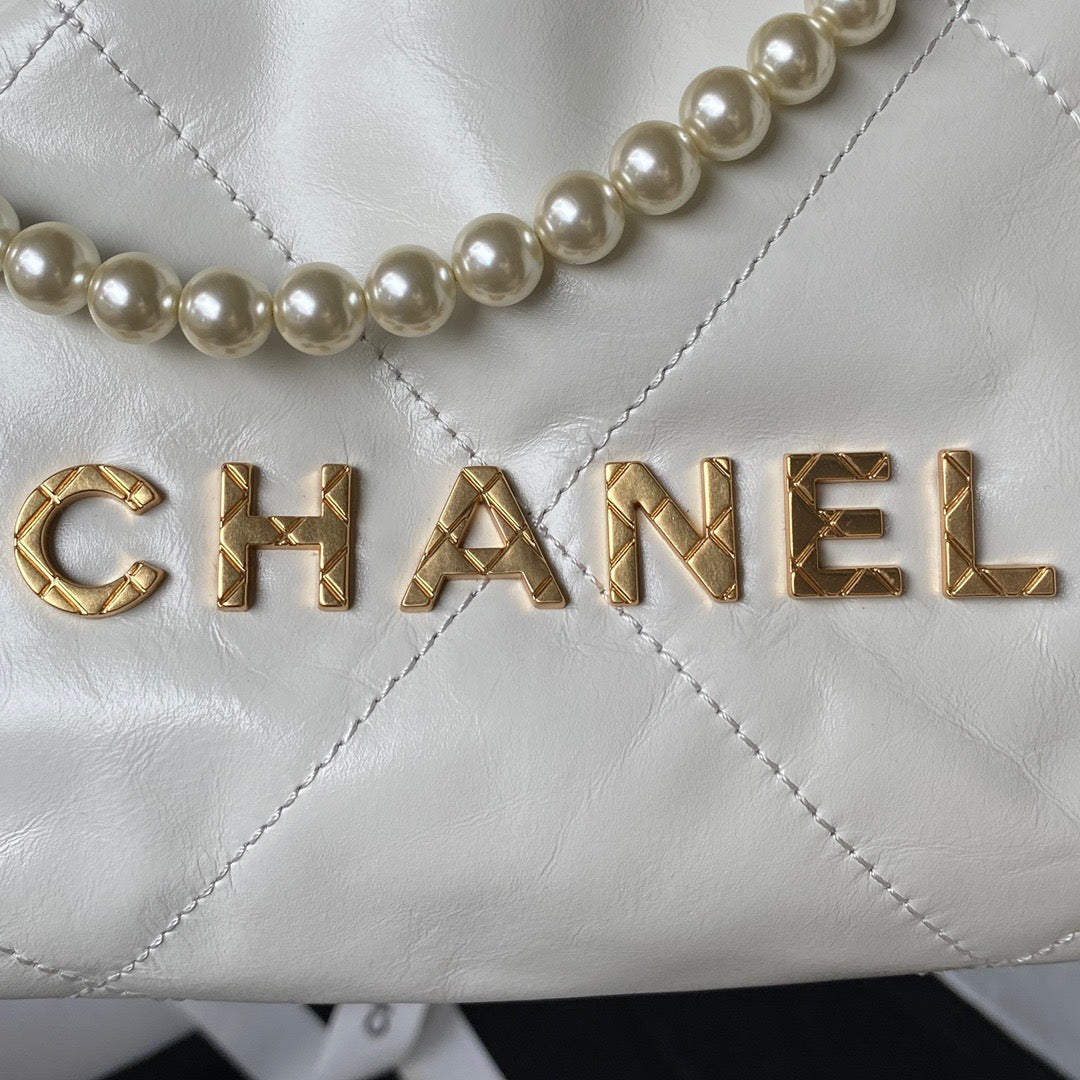 Chanel 22 Mini Pearl Bag In White Shiny Leather