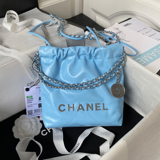 Chanel 22 Mini Silver Chain Bag In Blue Shiny Leather