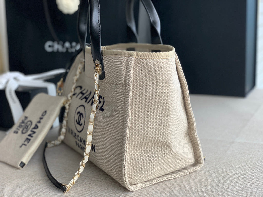 CHANEL Beach Canvas Tote Bag In Beige with Black Shoulder Straps