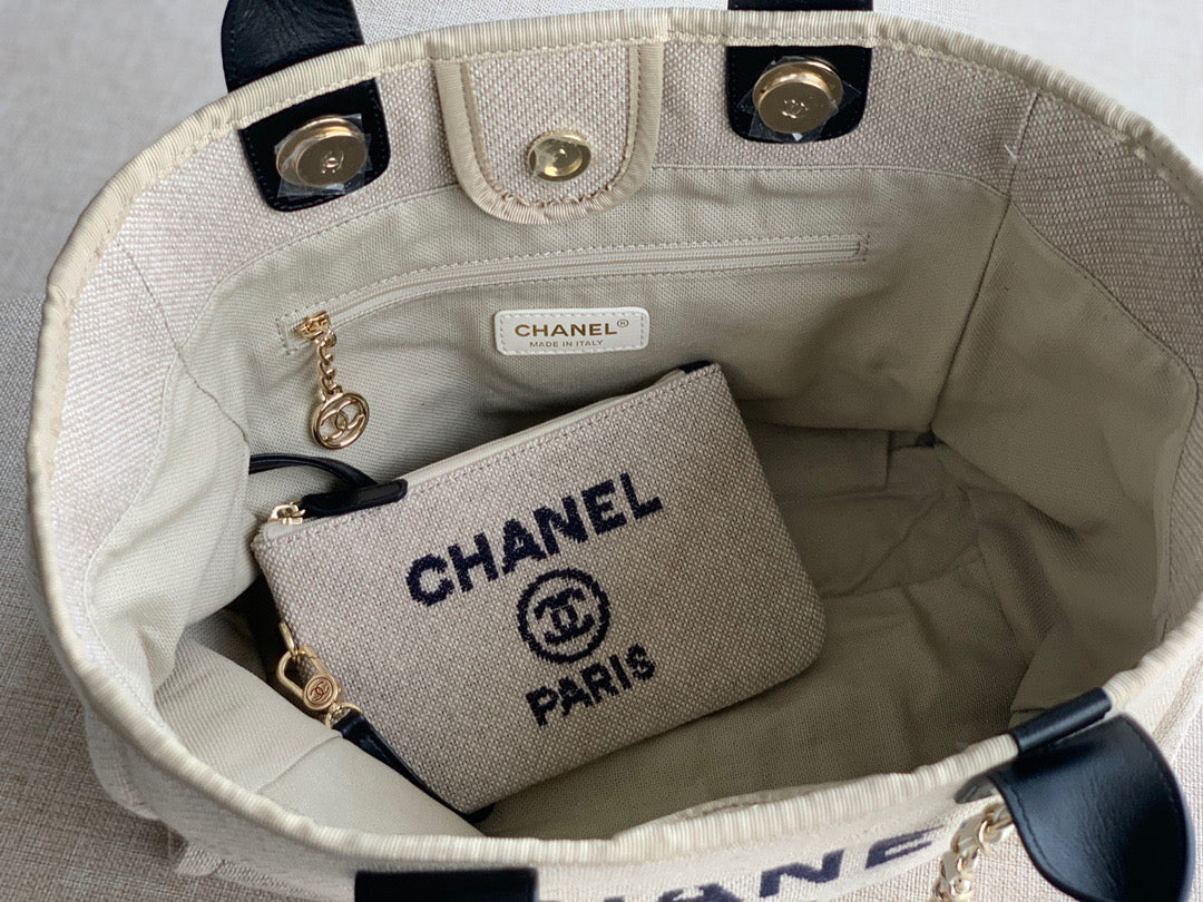 CHANEL Beach Canvas Tote Bag In Beige with Black Shoulder Straps