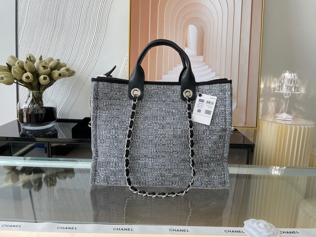 CHANEL Beach Canvas Tote Bag In Gray With Black Leather Strap