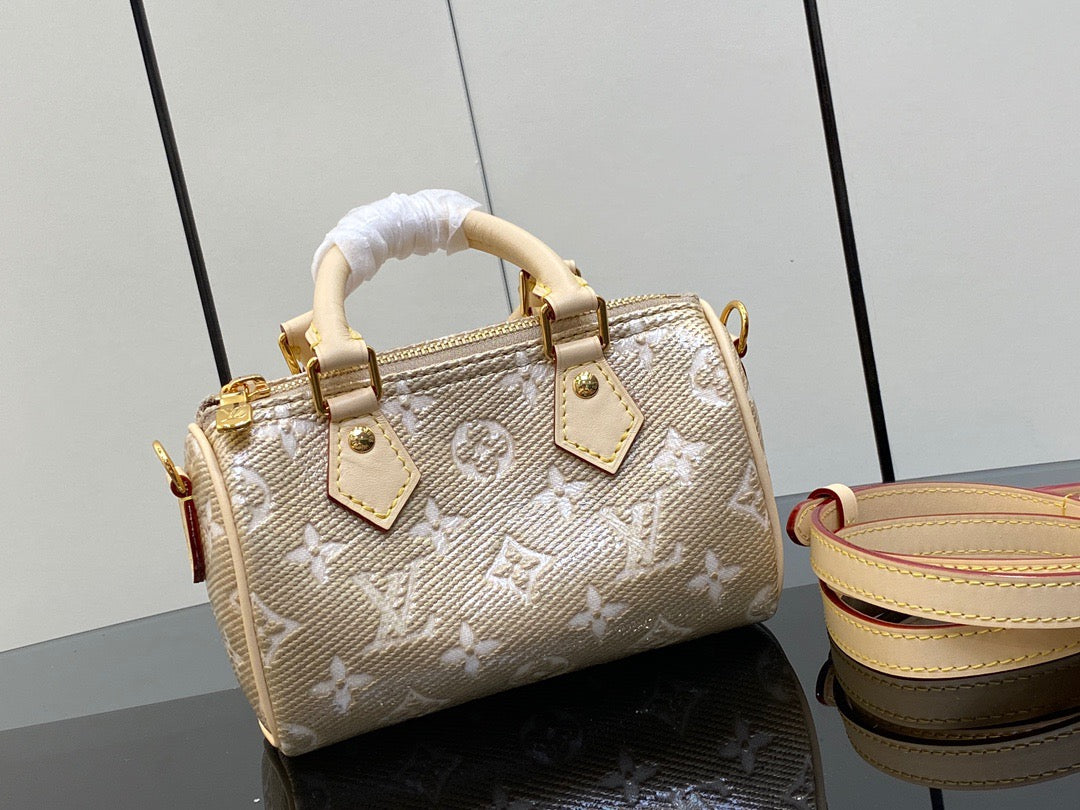 LV Speedy 16 In Gold Embossed Leather