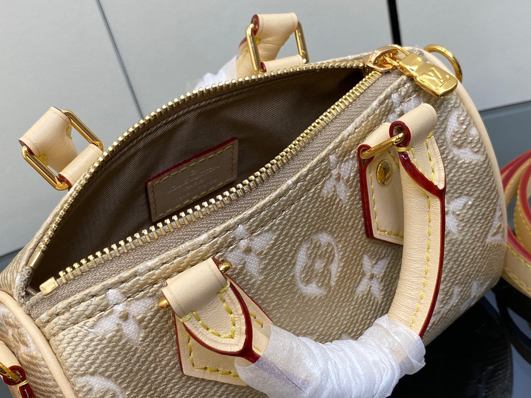 LV Speedy 16 In Gold Embossed Leather