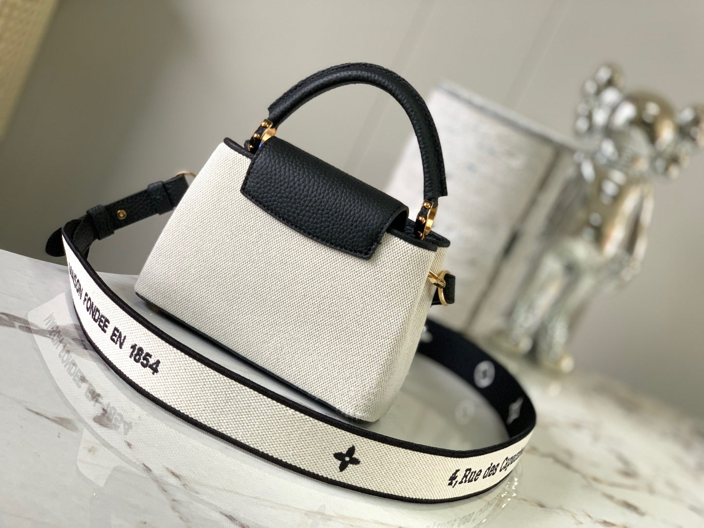 Louis Vuitton Capucines Mini  Bag In Beige With Black Handle