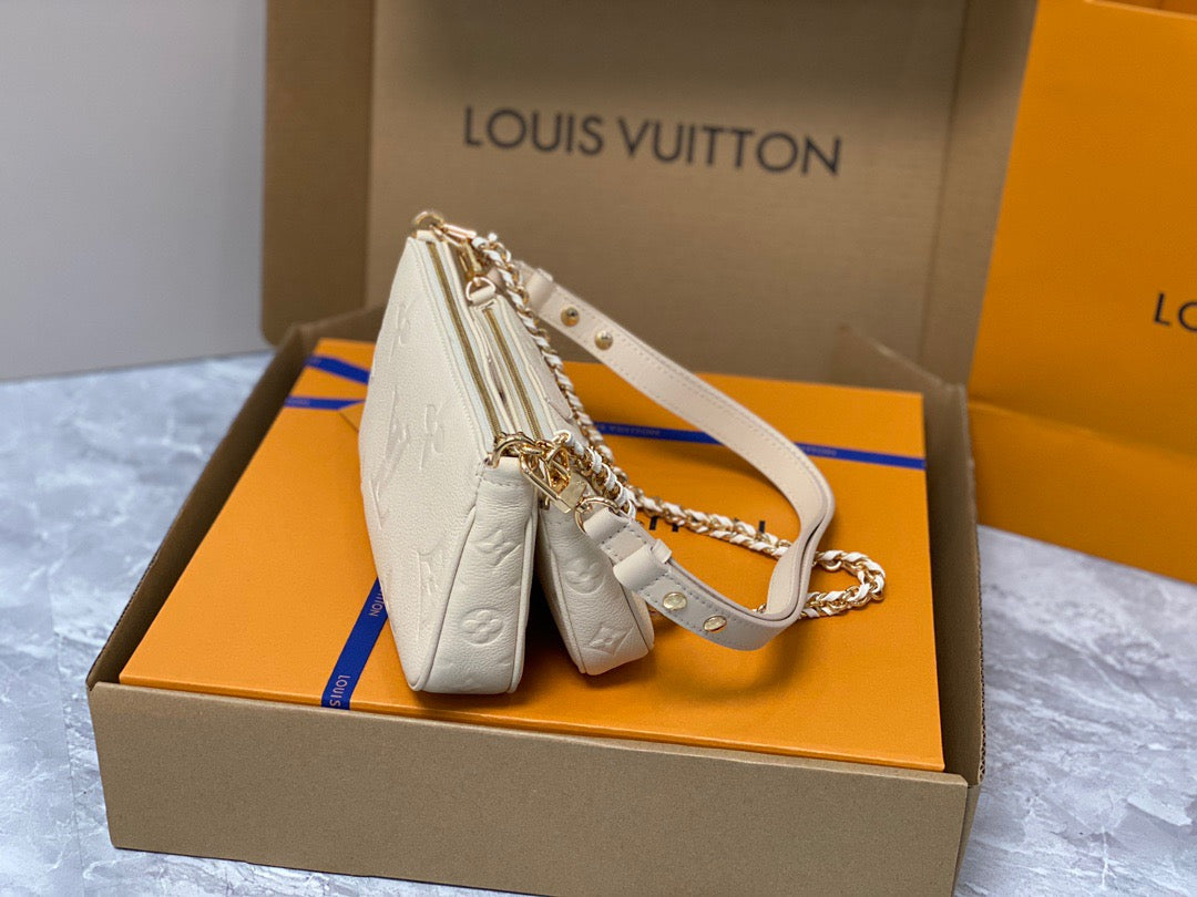 Louis Vuitton Large Pochette Accessories In Beige Embossed