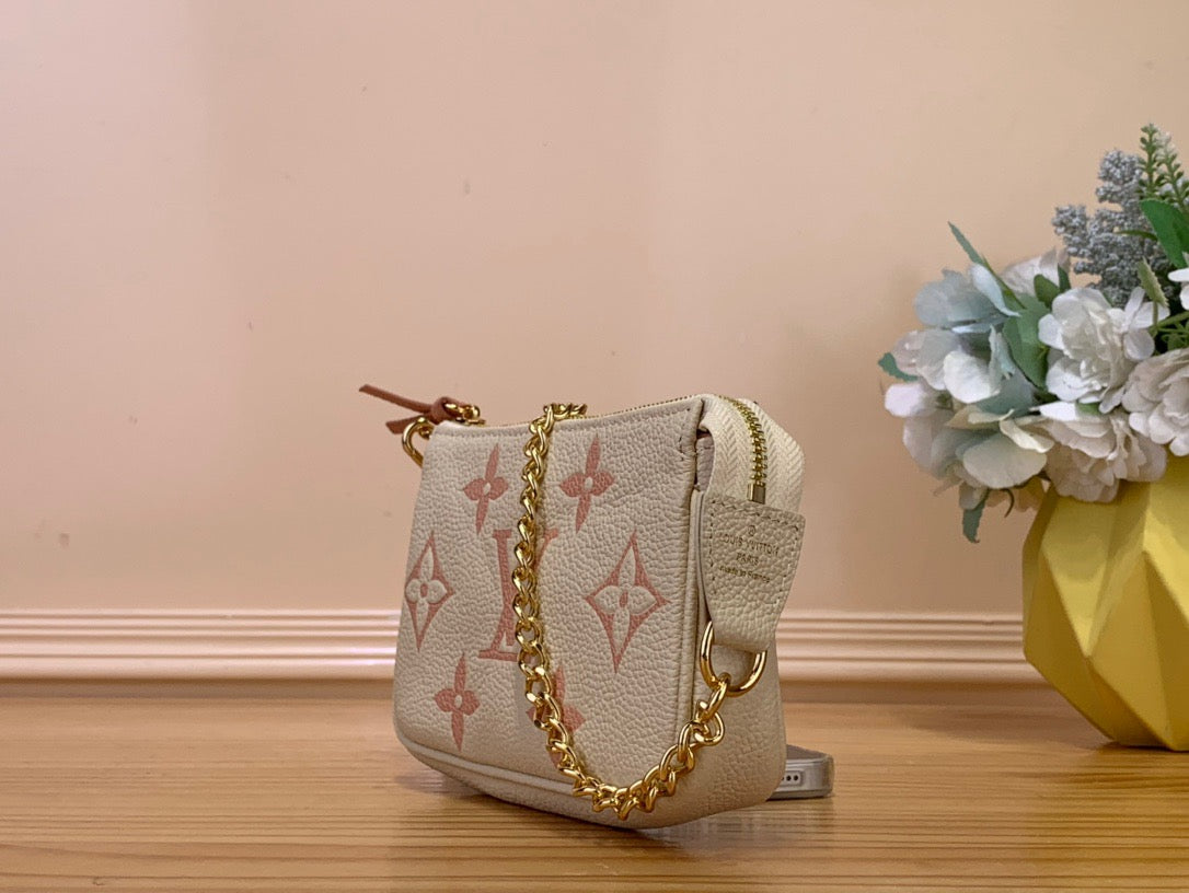 Louis Vuitton Mini Pochette Accessories In Pink Presbyopia