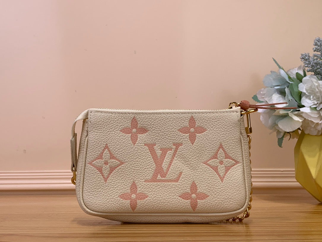 Louis Vuitton Mini Pochette Accessories In Pink Presbyopia