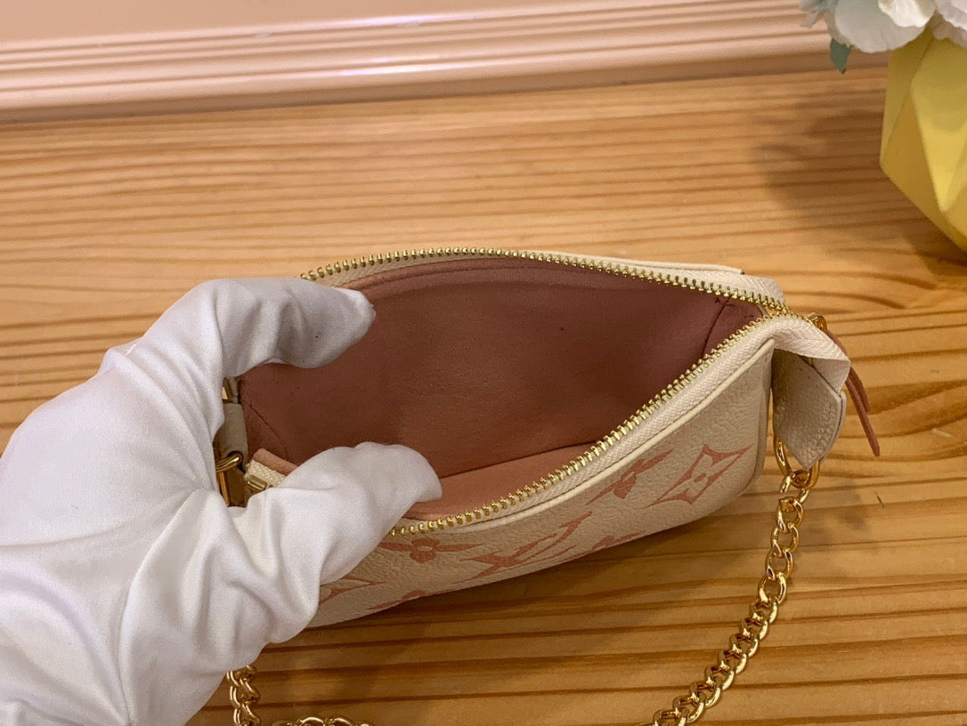 Louis Vuitton Mini Pochette Accessories In Pink Presbyopia