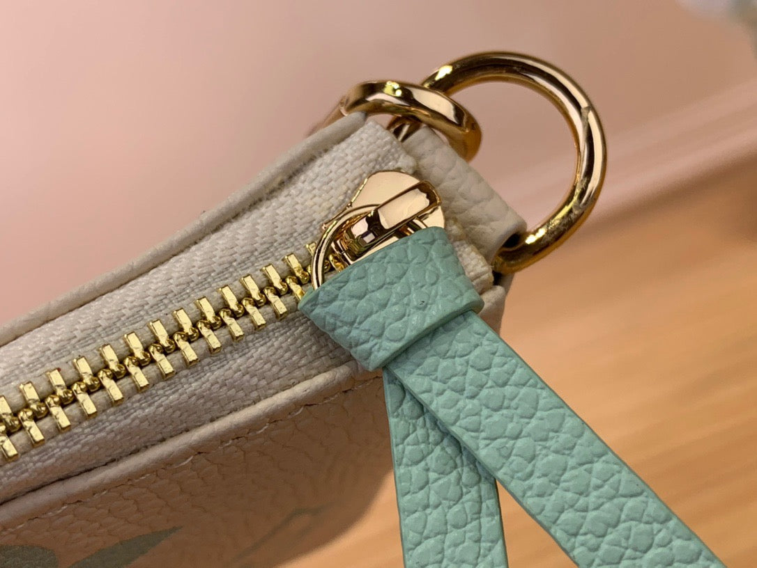 Louis Vuitton Mini Pochette Accessories In Light Blue Presbyopia