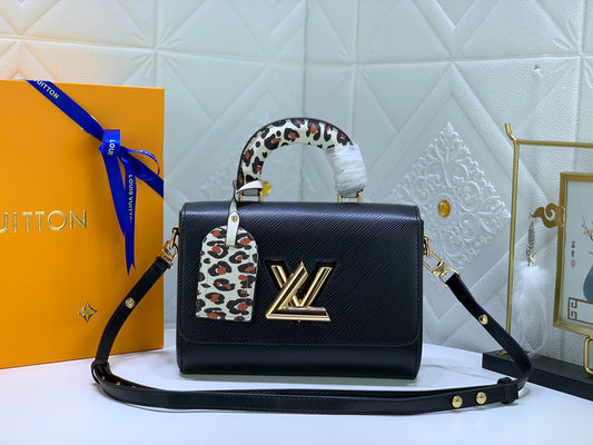 Louis Vuitton Twist Pouch In Black Epi Leather With Leopard Print Handle