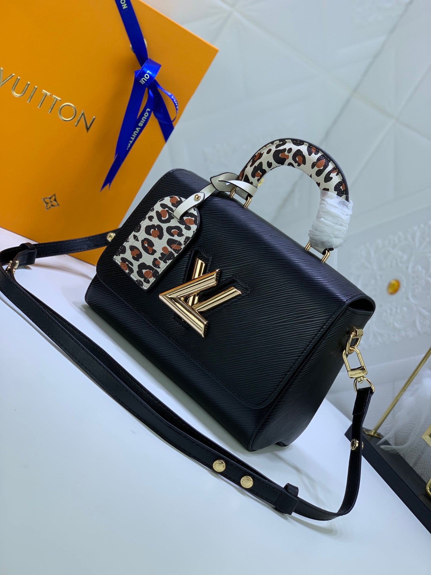 Louis Vuitton Twist Pouch In Black Epi Leather With Leopard Print Handle