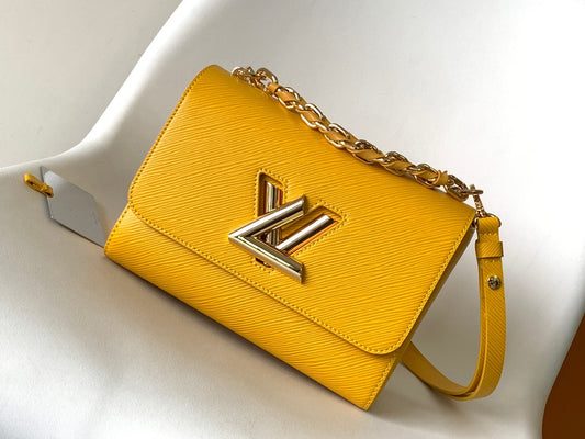 Louis Vuitton Twist Pouch In Yellow Epi Leather