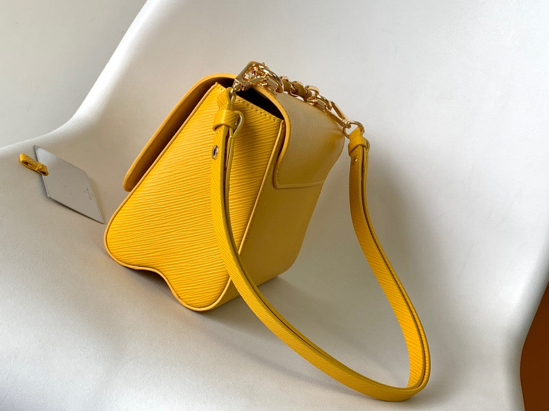 Louis Vuitton Twist Pouch In Yellow Epi Leather