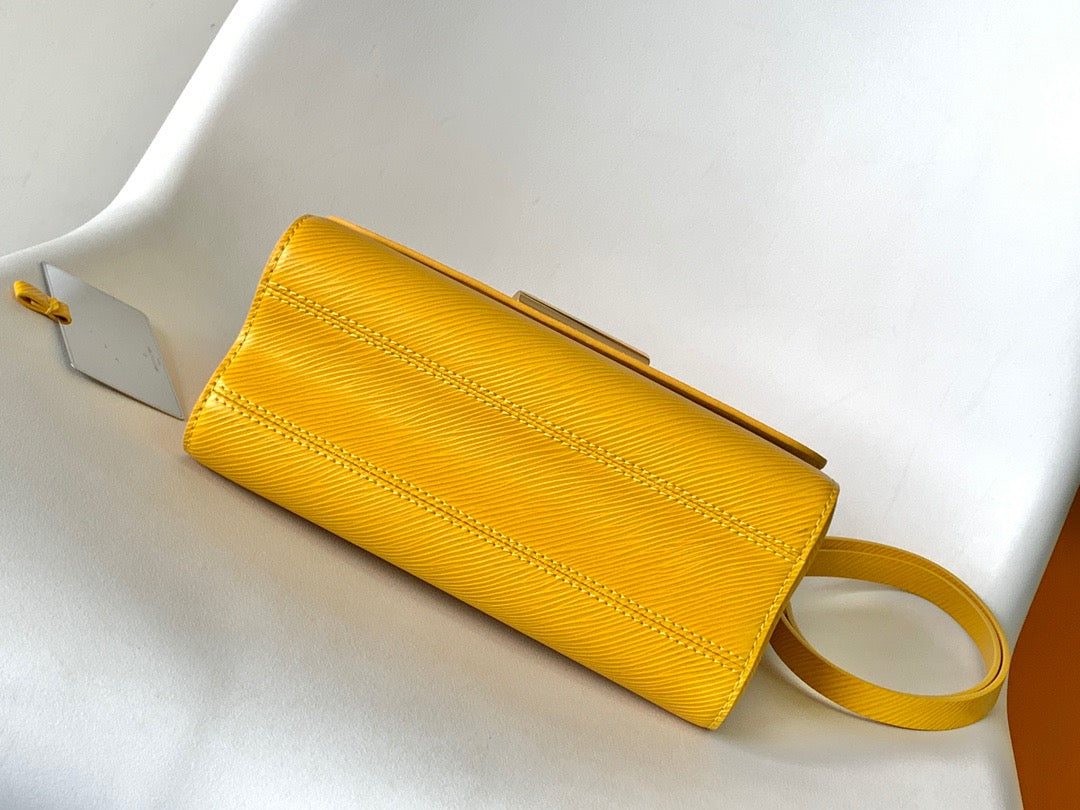 Louis Vuitton Twist Pouch In Yellow Epi Leather