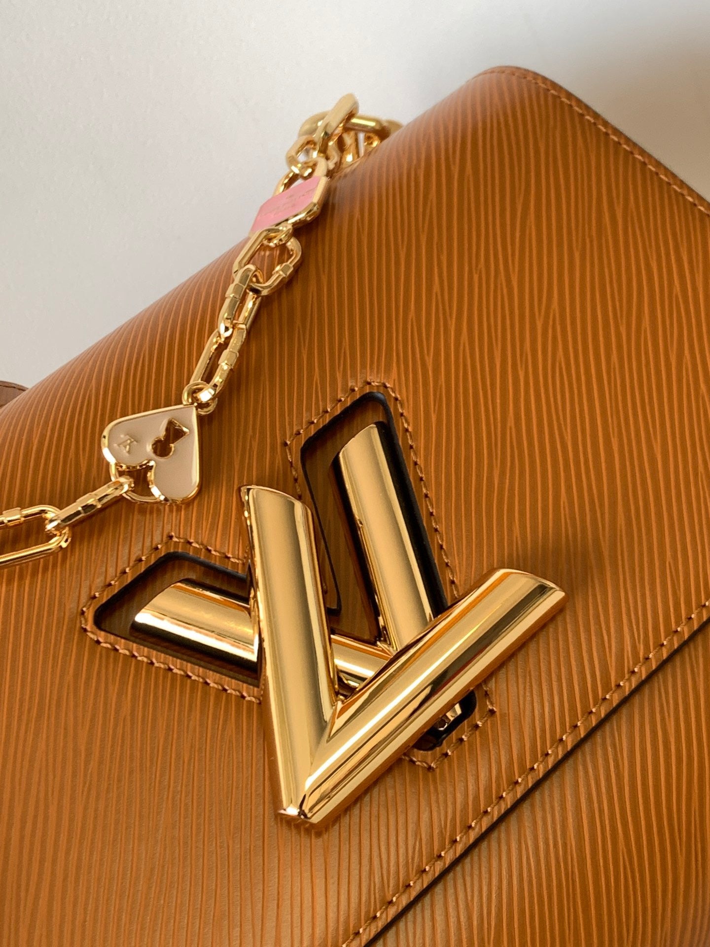 Louis Vuitton Twist Pouch In Gold Brown Epi Leather