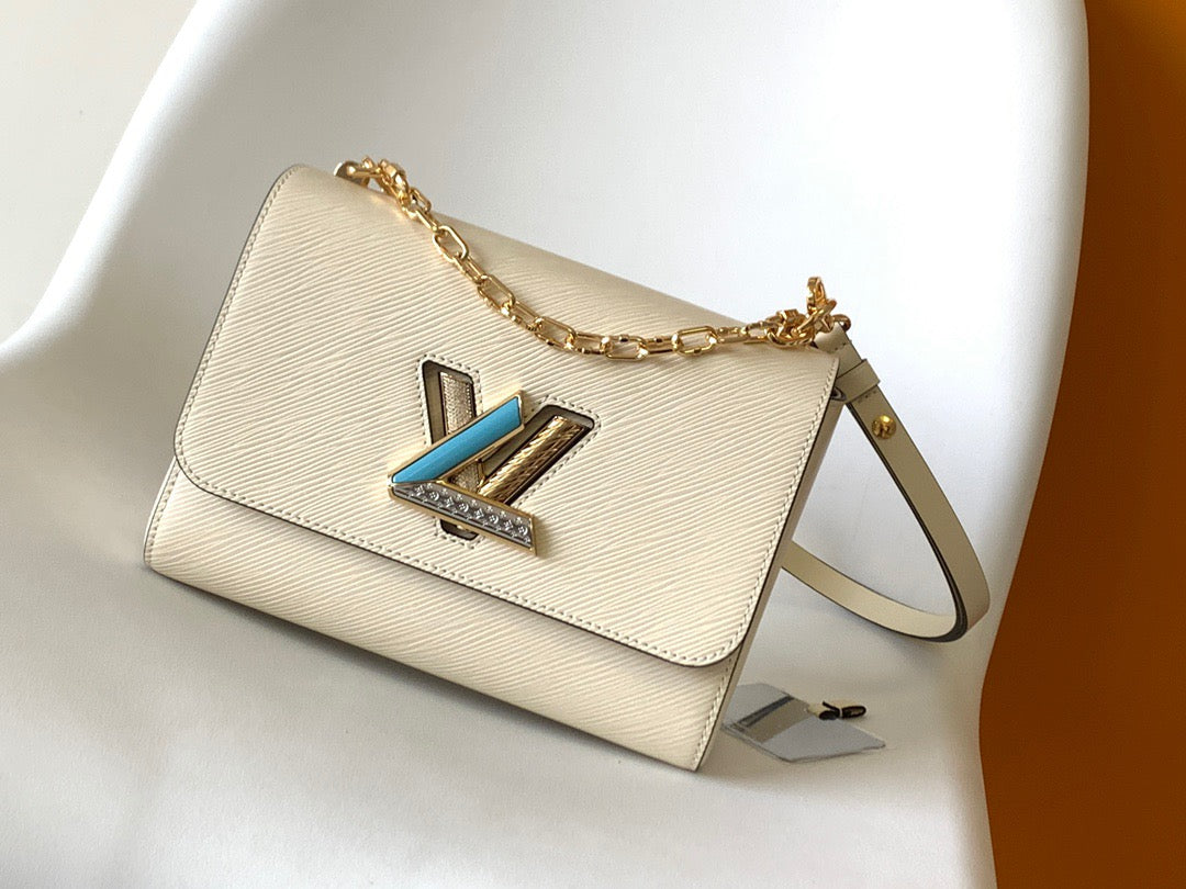 Louis Vuitton Twist Pouch In Beige Epi Leather With Gold Chain