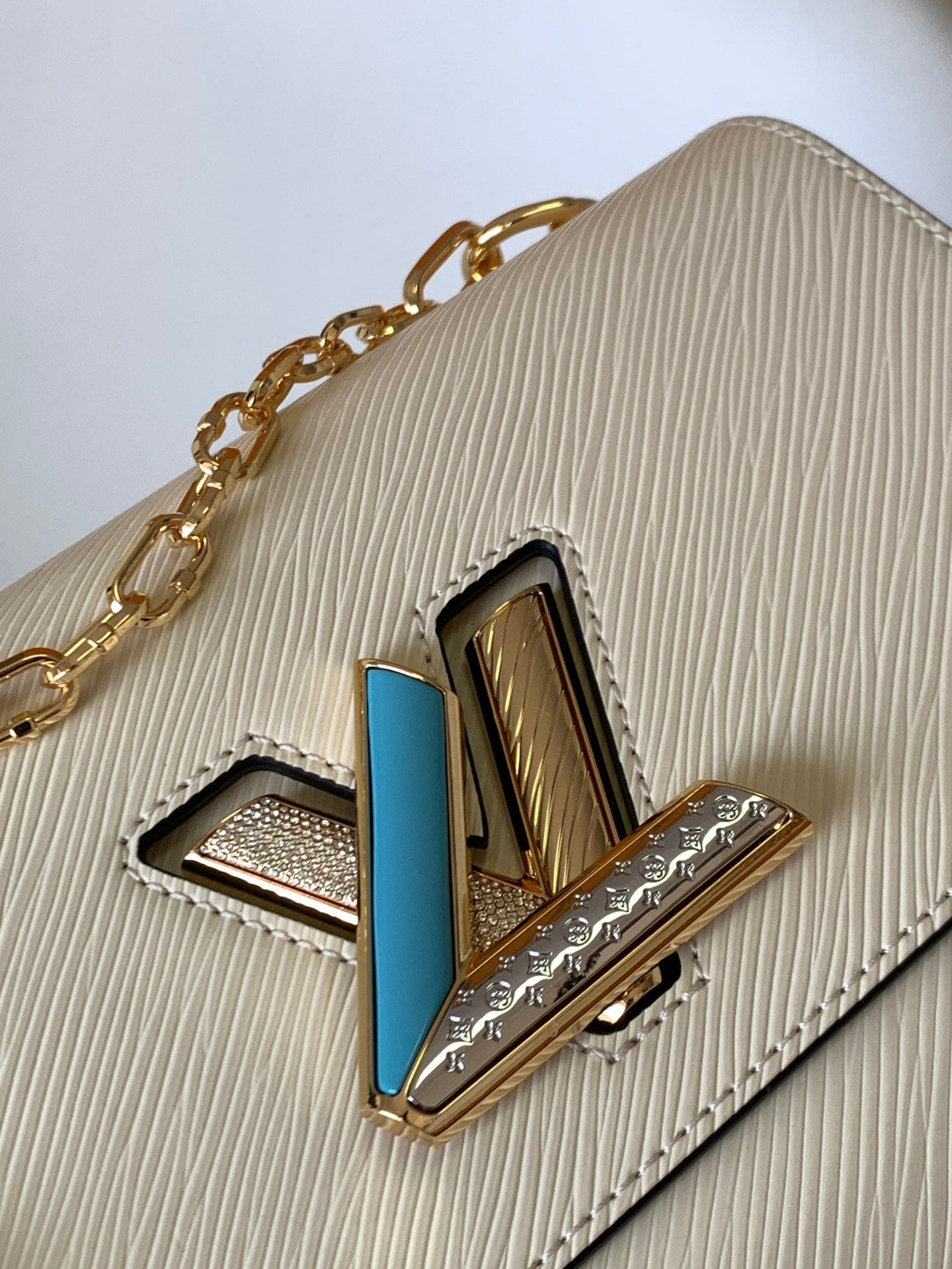 Louis Vuitton Twist Pouch In Beige Epi Leather With Gold Chain